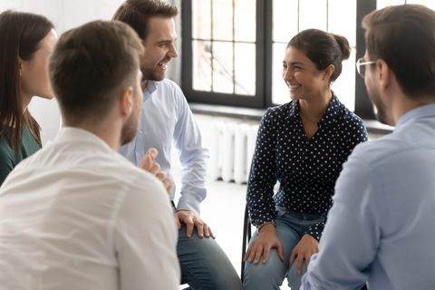 Men and women talking in a group