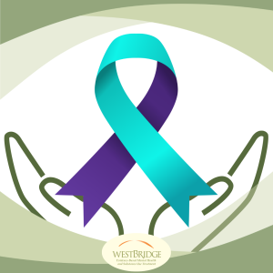 Hands holding suicide prevention awareness ribbon