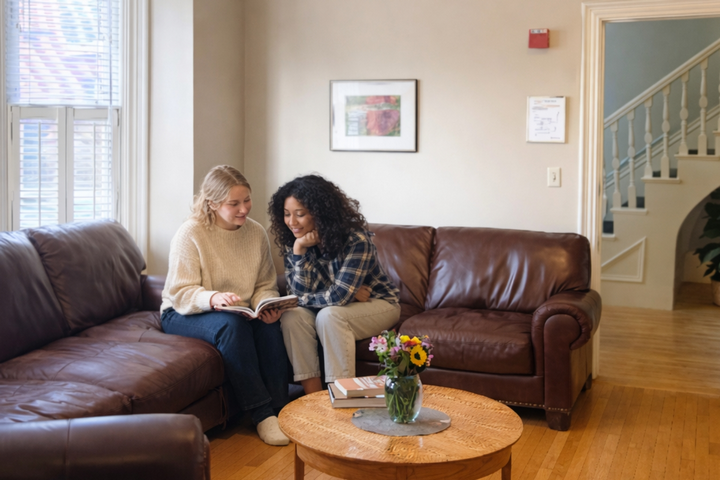 Two women sitting and chatting